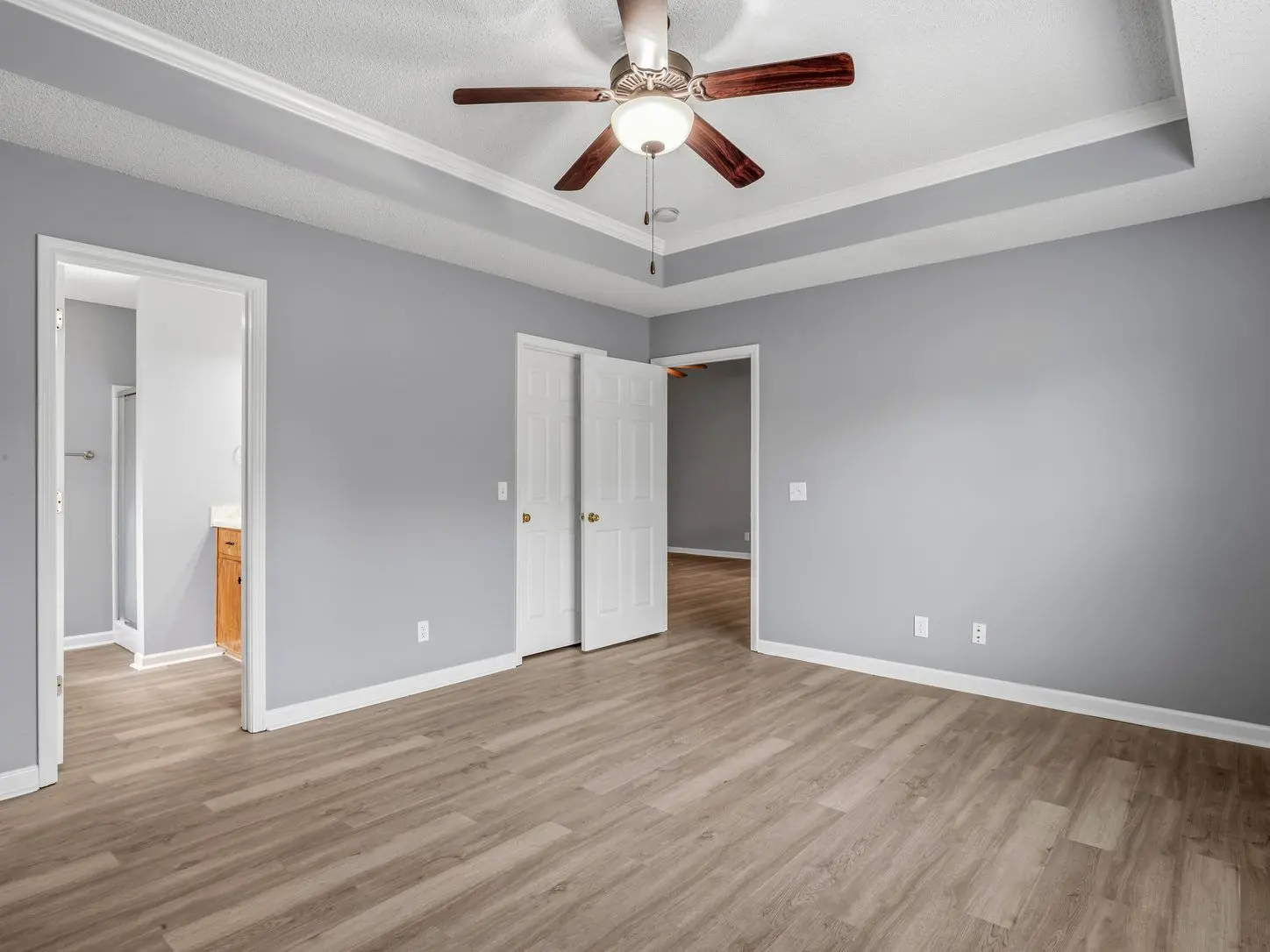 Empty primary bedroom before virtual staging