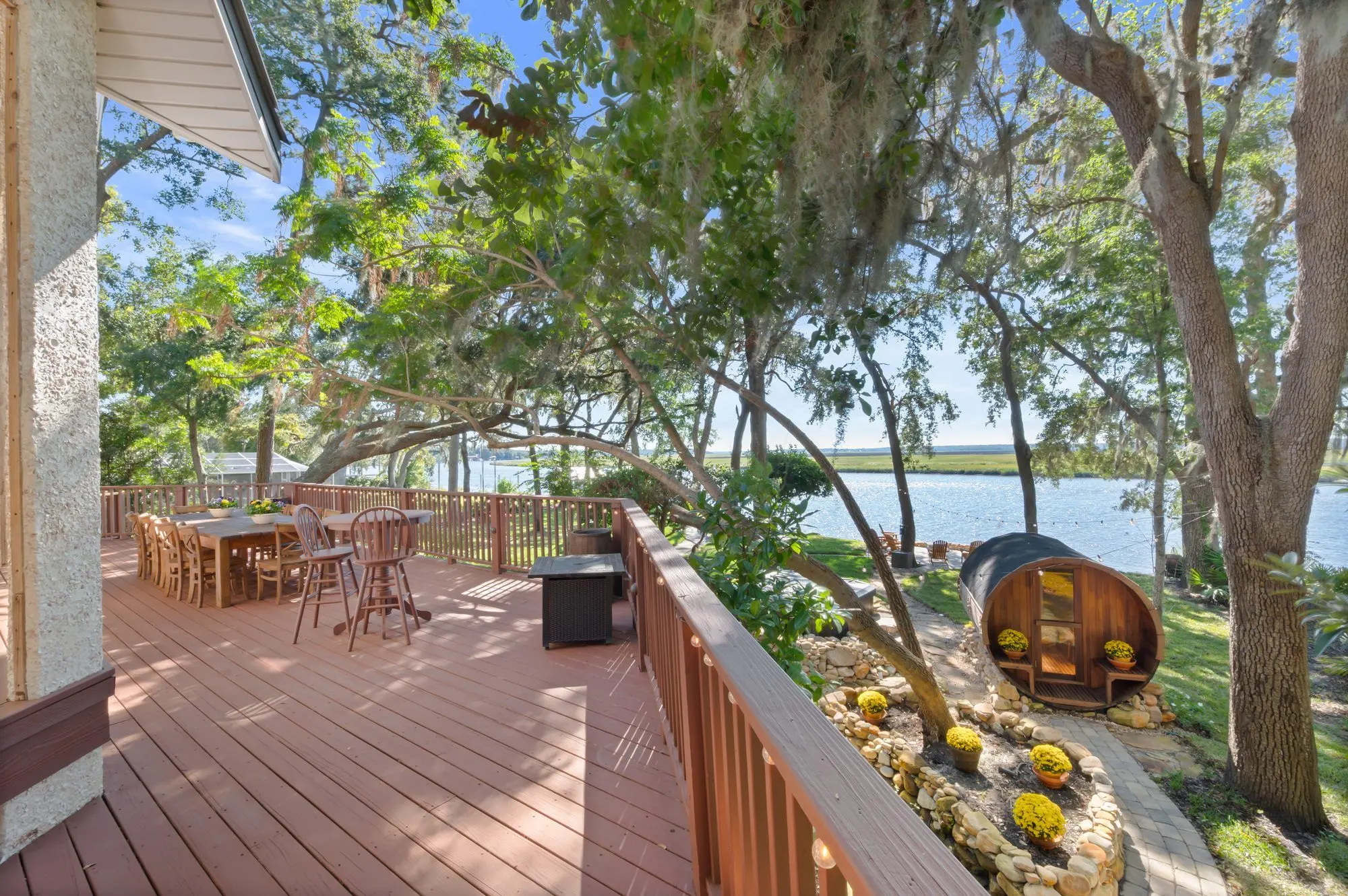 Deck overlooking the marsh under live oaks in Brunswick, GA